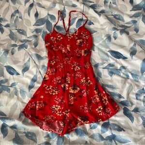 Red floral romper garage